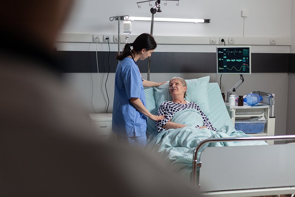Nurse caring for a patient in a clinical environment